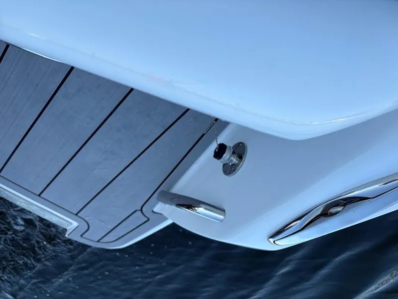 Slide: The Image of 2025 Nor-Tech 340 Sport boat, close-up of sleek deck and hardware details. - 8