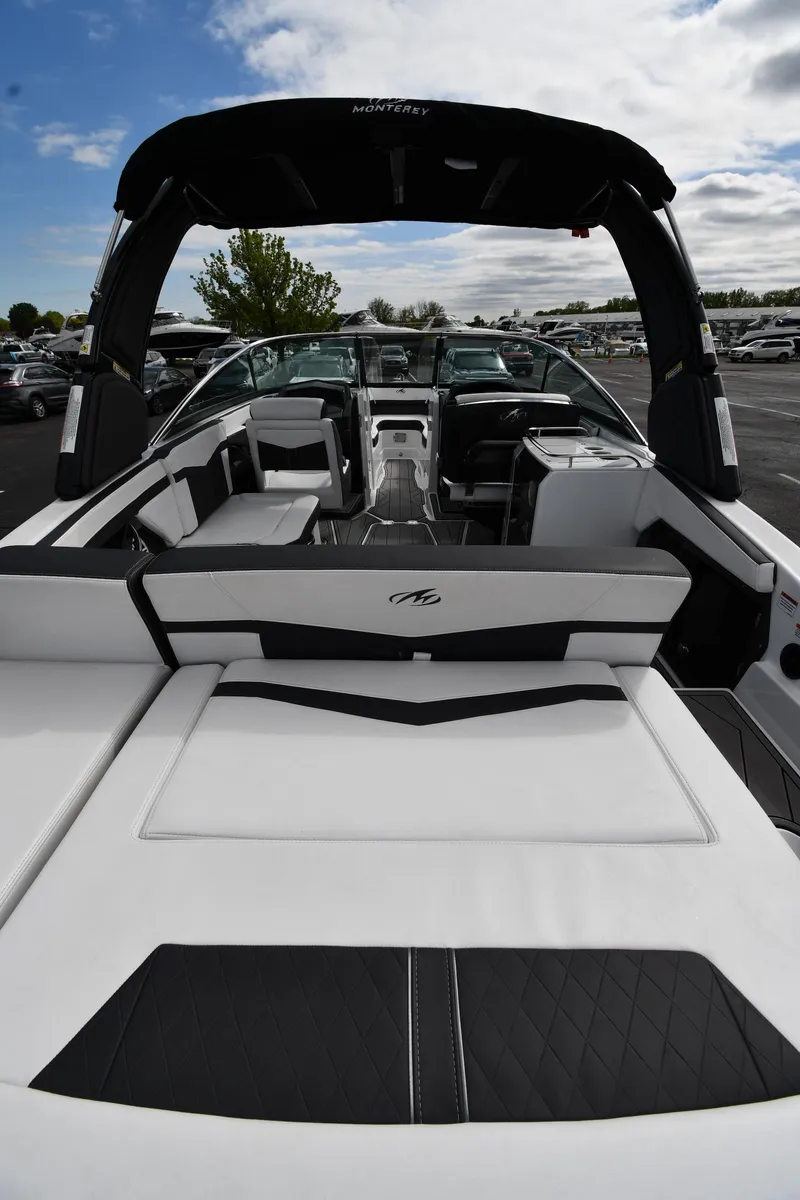 Slide: The Image of 2023 Monterey 278 Super Sport boat interior with sleek seating and modern design. - 10