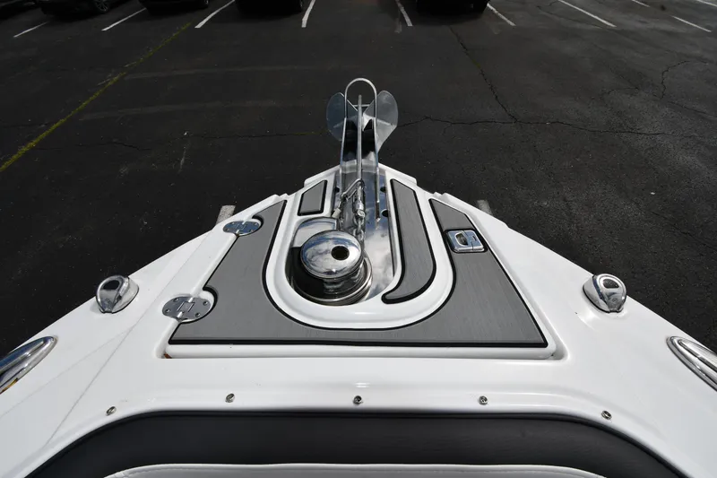 Slide: The Image of 2023 Monterey 278 Super Sport boat bow with anchor and deck details. - 11