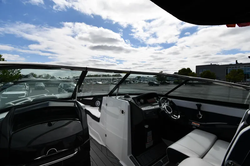 Slide: The Image of 2023 Monterey 278 Super Sport boat interior with sleek design and modern dashboard. - 15