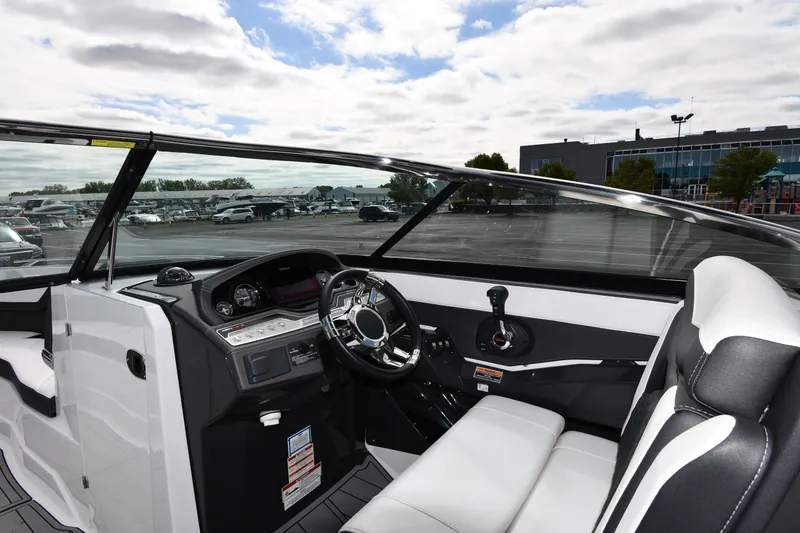 Slide: The Image of 2023 Monterey 278 Super Sport boat interior with sleek design and modern dashboard. - 16