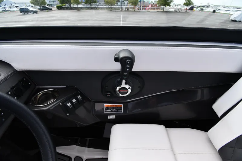 Slide: The Image of 2023 Monterey 278 Super Sport interior with sleek controls and white seating. - 19