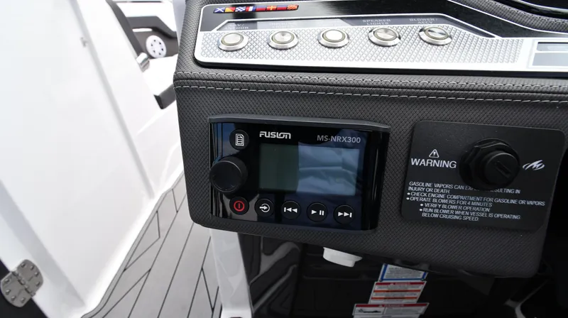 Slide: The Image of Control panel of 2023 Monterey 278 Super Sport boat with Fusion MS-NRX300 display. - 20