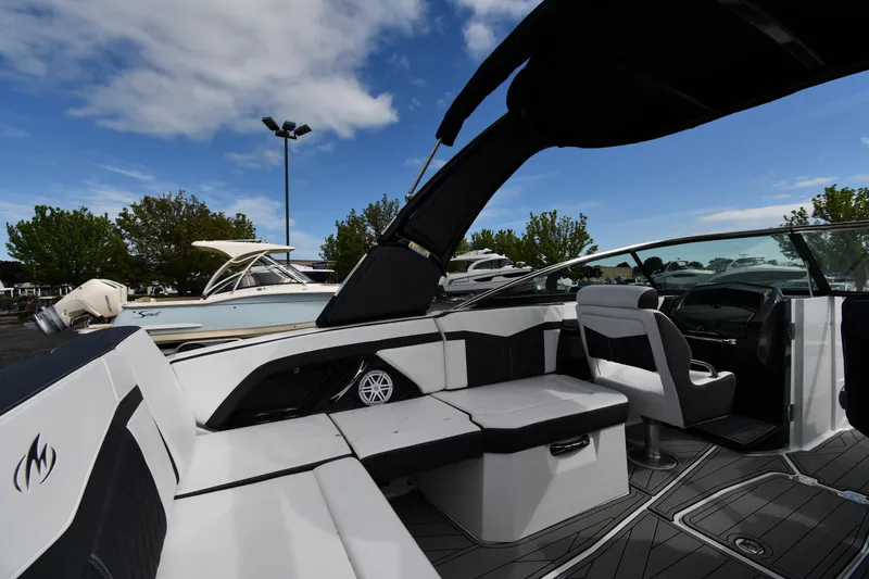Slide: The Image of 2023 Monterey 278 Super Sport boat interior with sleek seating and modern design. - 27