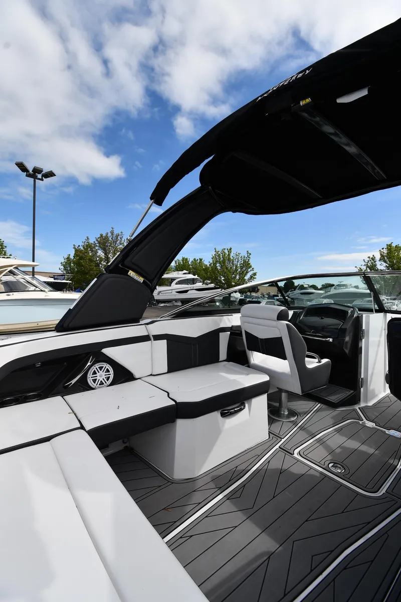 Slide: The Image of 2023 Monterey 278 Super Sport boat interior with sleek seating and modern design. - 28