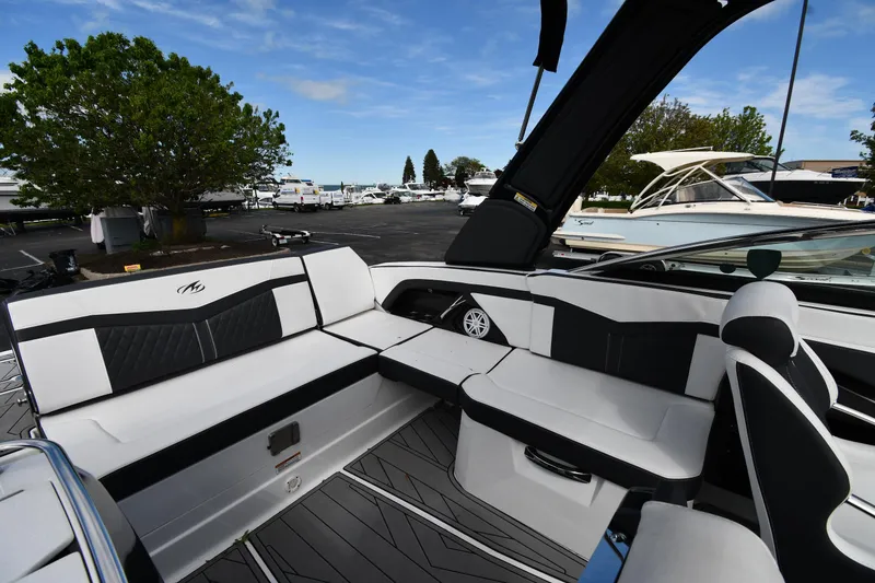 Slide: The Image of 2023 Monterey 278 Super Sport boat interior with sleek seating and modern design. - 29