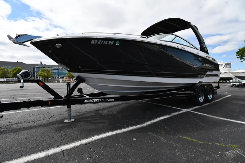 Slide: The Image of 2023 Monterey 278 Super Sport boat on trailer in parking lot. - 3