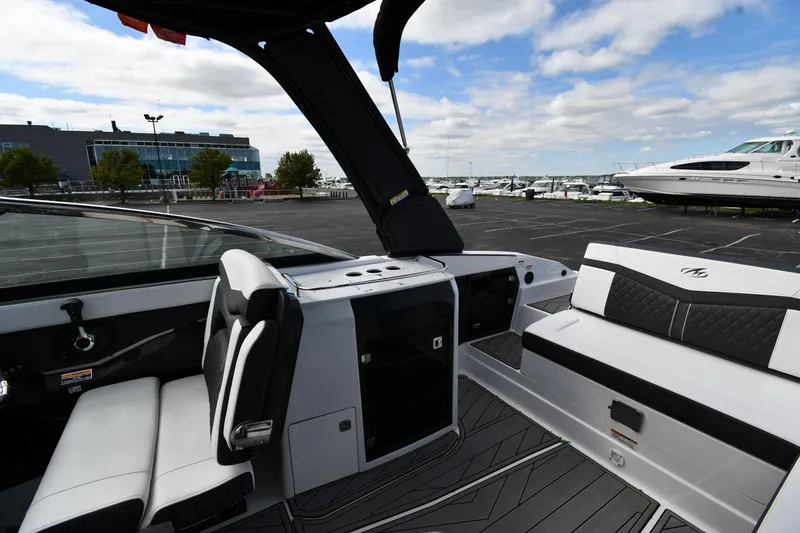 Slide: The Image of 2023 Monterey 278 Super Sport boat interior with sleek seating and modern design. - 30