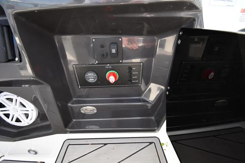 Slide: The Image of Control panel of 2023 Monterey 278 Super Sport boat with speaker and switches. - 34