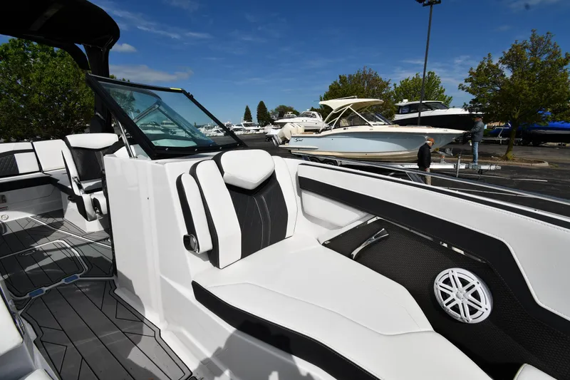 Slide: The Image of 2023 Monterey 278 Super Sport boat interior with sleek seating and modern design. - 38