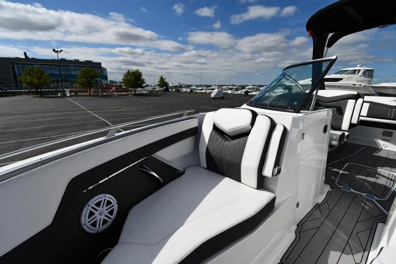 Slide: The Image of 2023 Monterey 278 Super Sport boat interior with sleek seating and modern design. - 39