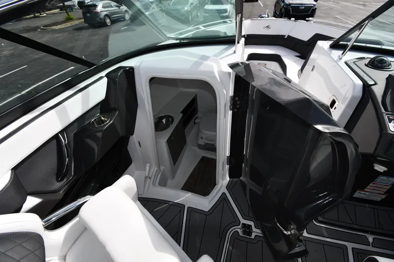Slide: The Image of 2023 Monterey 278 Super Sport boat interior with open cabin door. - 40