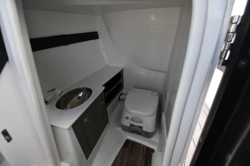 Slide: The Image of 2023 Monterey 278 Super Sport boat interior bathroom with sink and toilet. - 41
