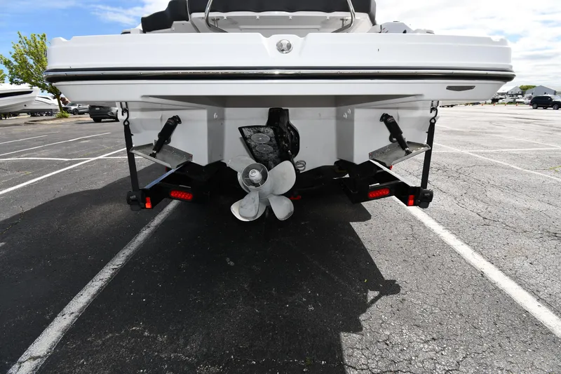 Slide: The Image of 2023 Monterey 278 Super Sport boat rear view in parking lot. - 6