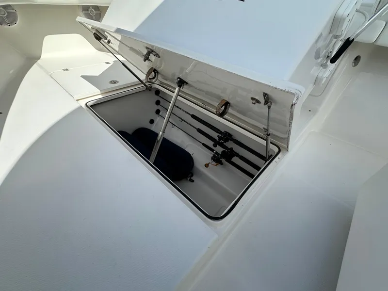 Slide: The Image of Open storage compartment on 2006 Island Runner 35 boat deck. - 43