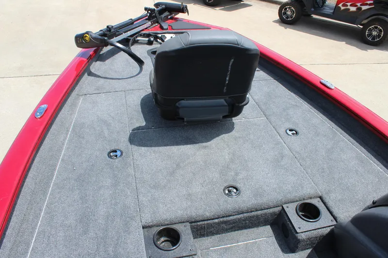 Slide: The Image of 2025 Tracker Pro Team 175 boat deck with seating and fishing rod holders. - 11