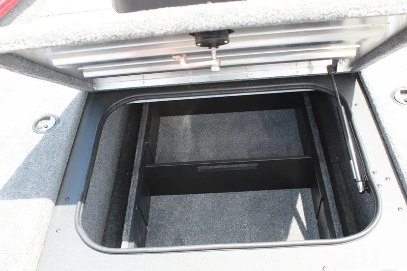 Slide: The Image of Open storage compartment in 2025 Tracker Pro Team 175 boat. - 16