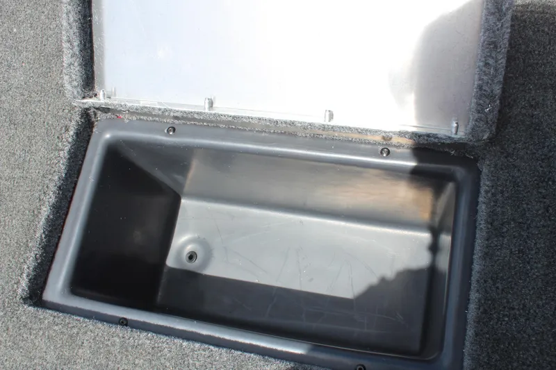 Slide: The Image of Open storage compartment in 2025 Tracker Pro Team 175 boat. - 18