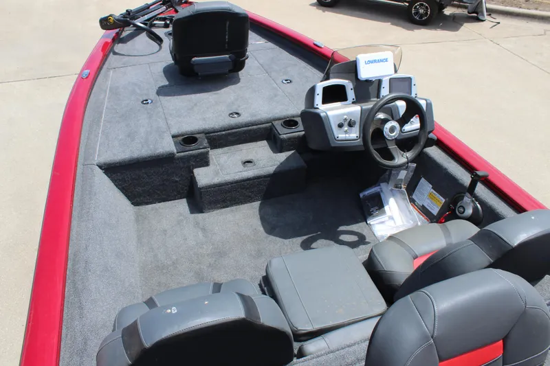 Slide: The Image of 2025 Tracker Pro Team 175 boat interior with steering console and seating. - 8