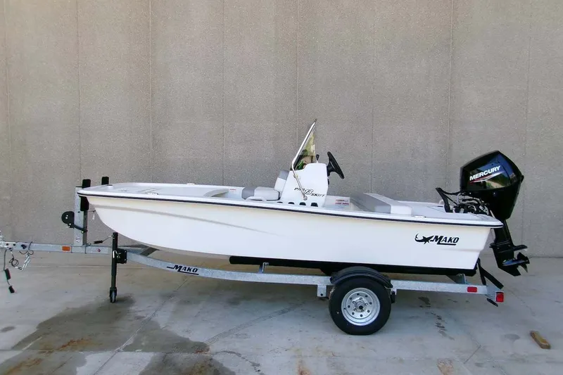 The Image of 2025 Mako Pro Skiff 13 CC boat on trailer, side view. - 0