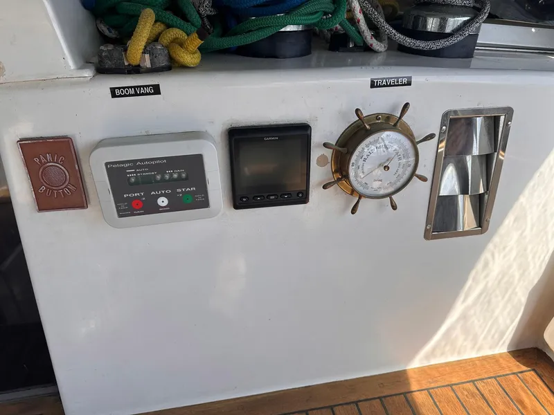 Slide: The Image of Control panel on a 1985 Whiting 40 sailboat with gauges and equipment. - 10