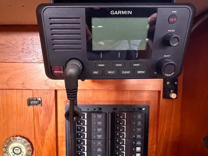 Slide: The Image of Garmin marine radio and control panel on a 1985 Whiting 40 sailboat. - 17