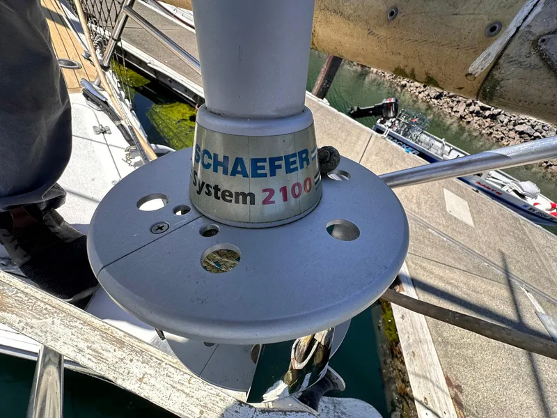 Slide: The Image of Schaefer System 2100 on 1985 Whiting 40 sailboat deck, marina background. - 7