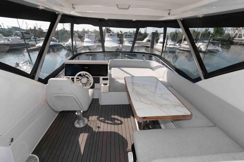 Slide: The Image of Luxurious interior of 2022 Azimut Fly 50 yacht with helm and seating area. - 11