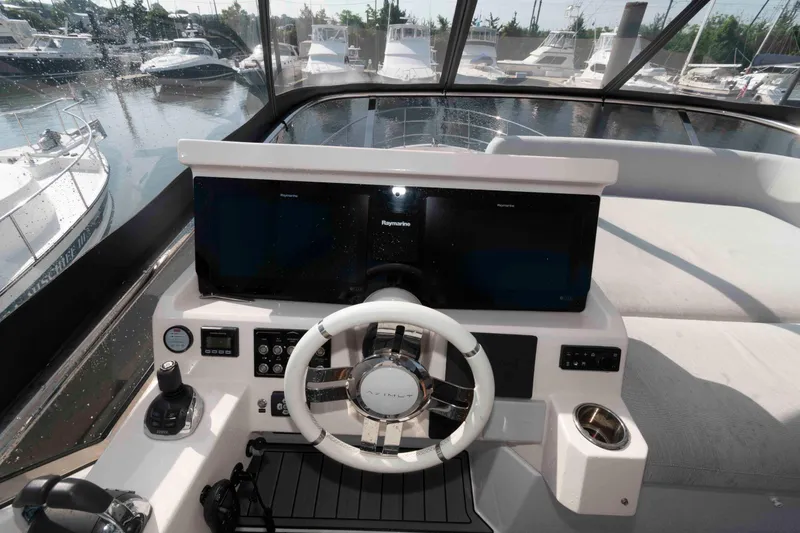 Slide: The Image of Cockpit of 2022 Azimut Fly 50 yacht with modern navigation equipment. - 14