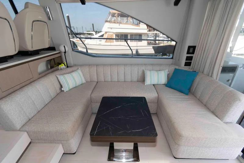 Slide: The Image of Luxurious interior of 2022 Azimut Fly 50 yacht with plush seating and modern decor. - 24