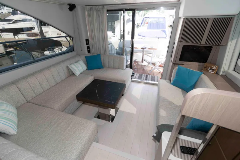 Slide: The Image of Luxurious interior of 2022 Azimut Fly 50 yacht with modern seating and elegant decor. - 26