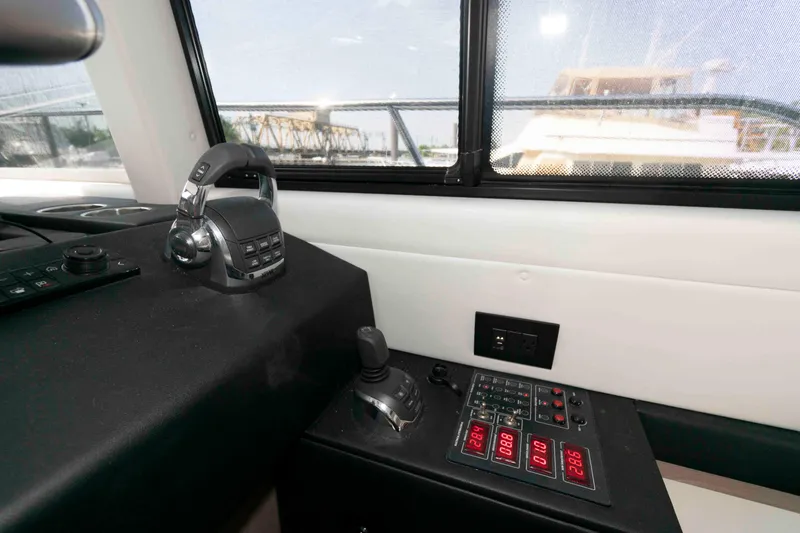 Slide: The Image of Control panel of 2022 Azimut Fly 50 yacht, featuring modern navigation equipment. - 32