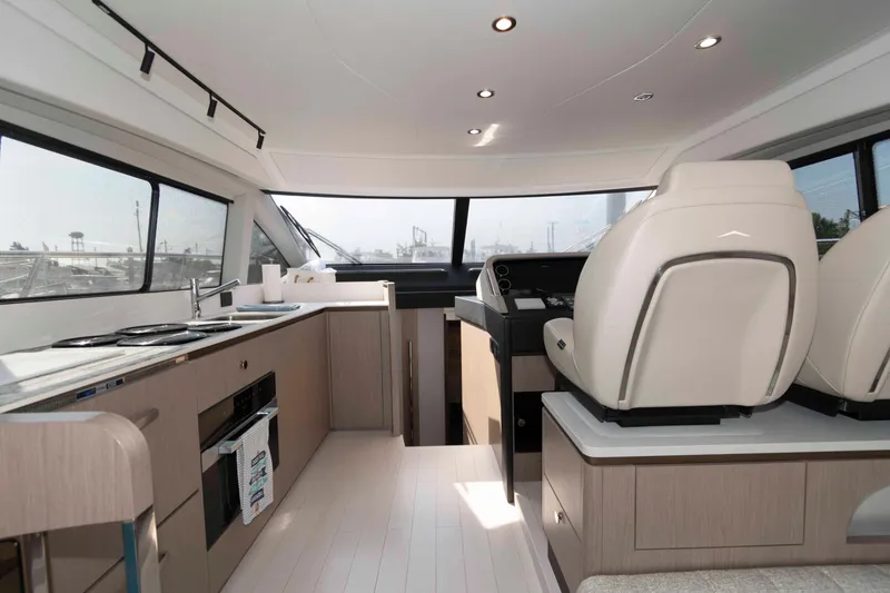 Slide: The Image of Interior of 2022 Azimut Fly 50 yacht with modern kitchen and helm station. - 33