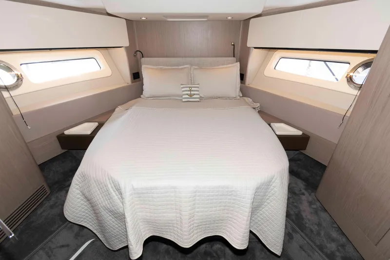 Slide: The Image of Luxurious bedroom interior of 2022 Azimut Fly 50 yacht with elegant bedding. - 34