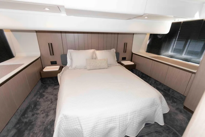 Slide: The Image of Luxurious bedroom interior of 2022 Azimut Fly 50 yacht with modern design and cozy bedding. - 36