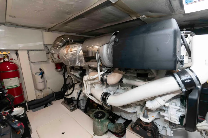 Slide: The Image of Engine room of 2022 Azimut Fly 50 yacht, featuring modern machinery and fire safety equipment. - 45