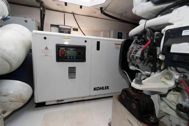 Slide: The Image of Engine room of 2022 Azimut Fly 50 yacht featuring Kohler generator. - 46