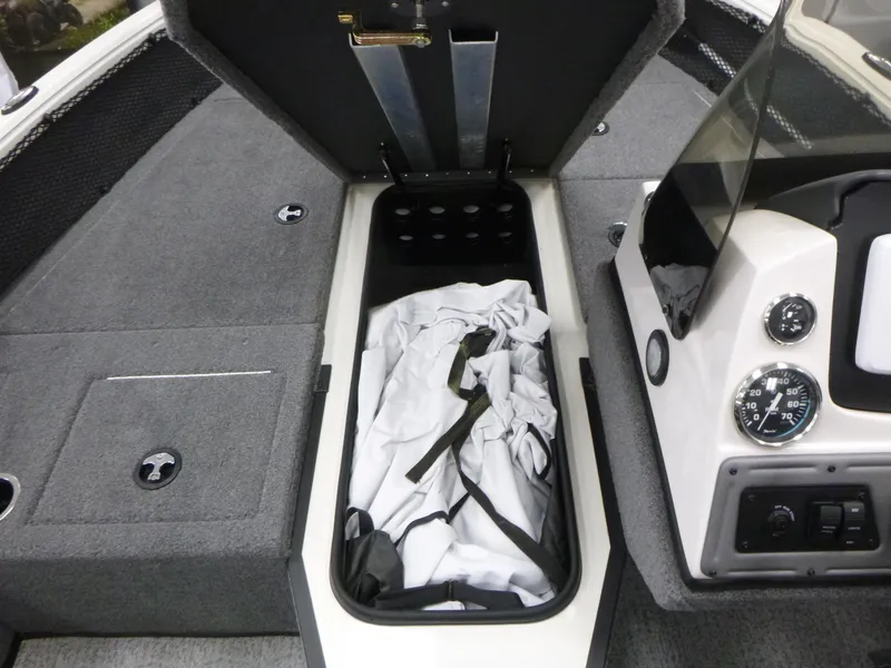 Slide: The Image of 2024 Ranger VS1782SC Angler boat interior with storage compartment and control panel. - 10