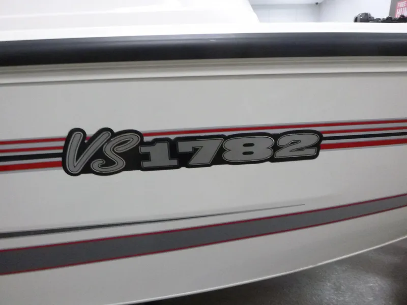 Slide: The Image of 2024 Ranger VS1782SC Angler boat with sleek design and bold graphics. - 13