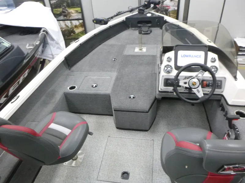 Slide: The Image of 2024 Ranger VS1782SC Angler boat interior with steering wheel and Lowrance display. - 3