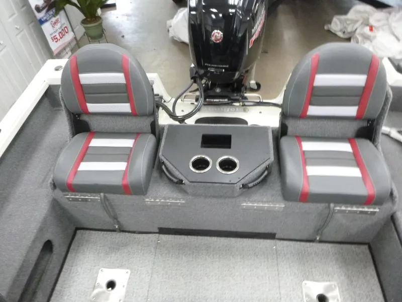 Slide: The Image of 2024 Ranger VS1782SC Angler boat interior with dual seats and motor. - 5