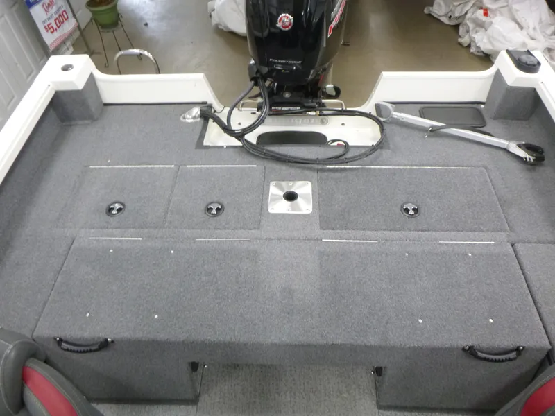 Slide: The Image of 2024 Ranger VS1782SC Angler boat interior with motor and storage compartments. - 6