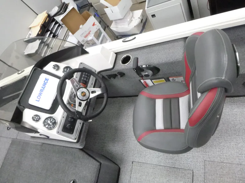 Slide: The Image of 2024 Ranger VS1782SC Angler boat cockpit with steering wheel and seat. - 8