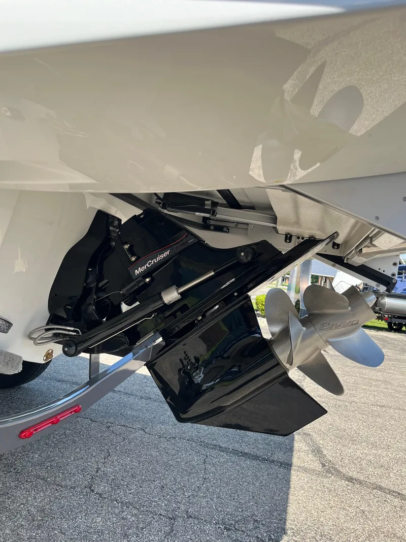 Slide: The Image of 2026 Crownline 298 SS boat propeller and outdrive detail, showcasing sleek design and engineering. - 16