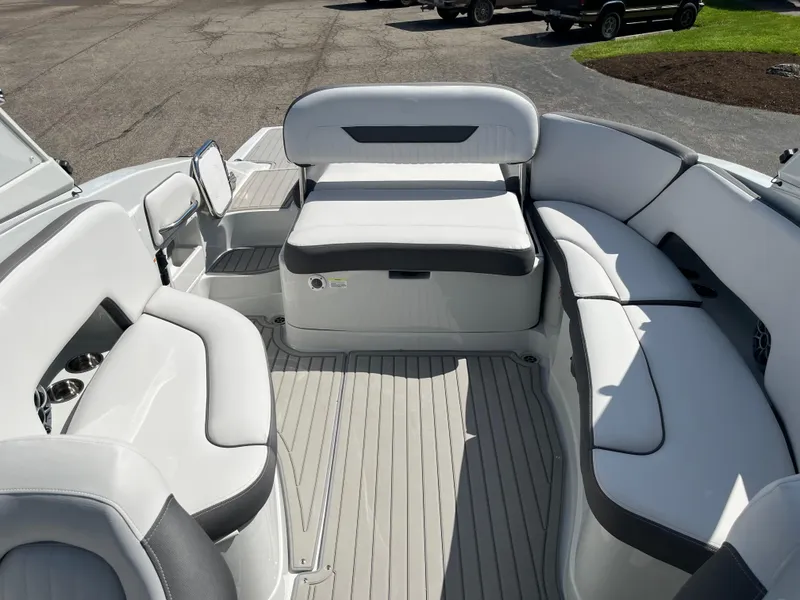 Slide: The Image of 2026 Crownline 298 SS boat interior with spacious seating and modern design. - 7