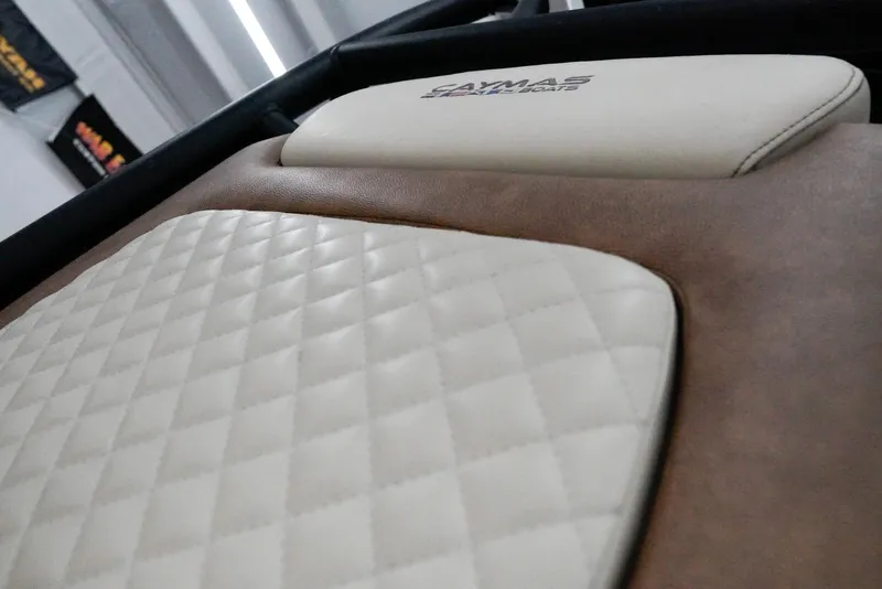 Slide: The Image of Caymas 26 HB 2020 boat interior with quilted leather seating. - 12