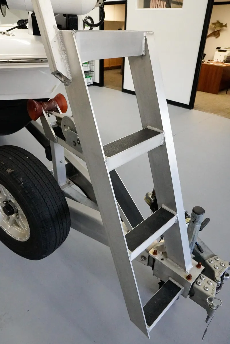 Slide: The Image of Aluminum boat trailer ladder attached to a 2020 Caymas 26 HB. - 6