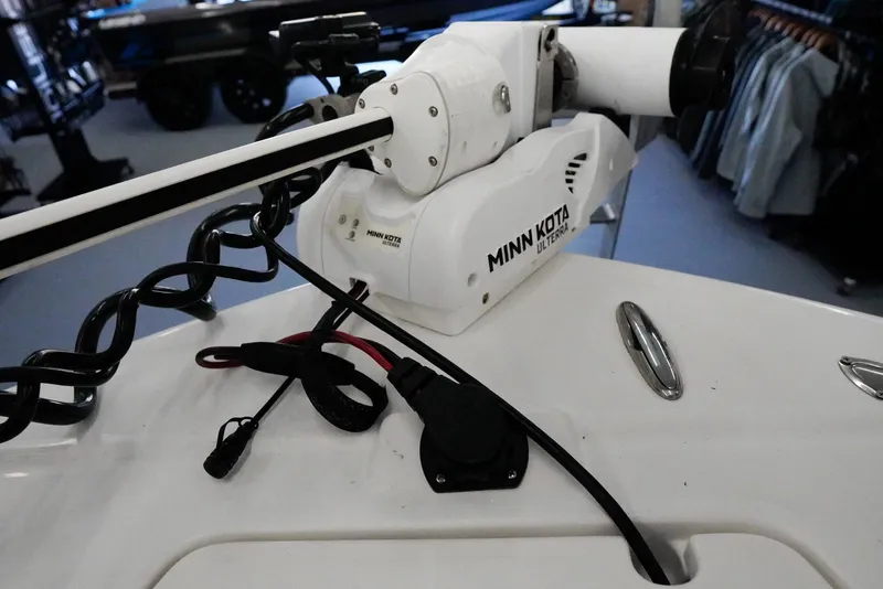 Slide: The Image of Minn Kota Ulterra motor on 2020 Caymas 26 HB boat deck. - 8