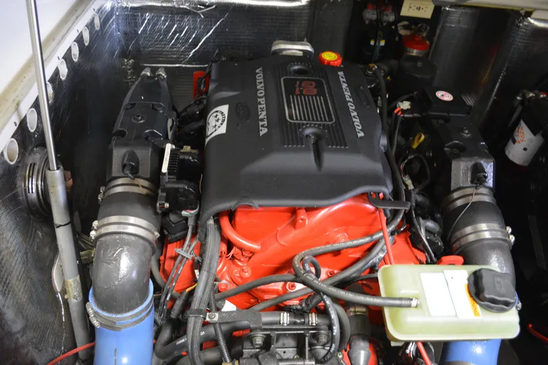 Slide: The Image of 2004 Carolina Classic 28 engine compartment with Volvo Penta engine, detailed view. - 14