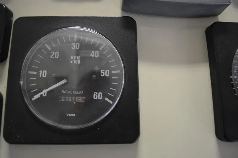 Slide: The Image of 2004 Carolina Classic 28 RPM gauge displaying engine hours. - 17